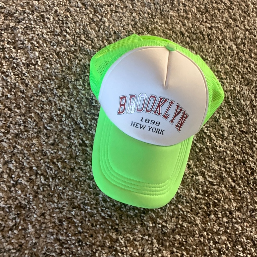 Green and white Brooklyn hat